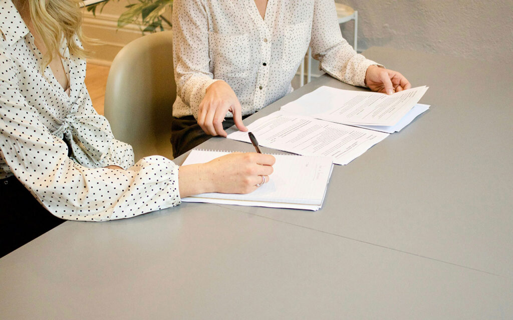 lady signing - Home - FastStamp Notary